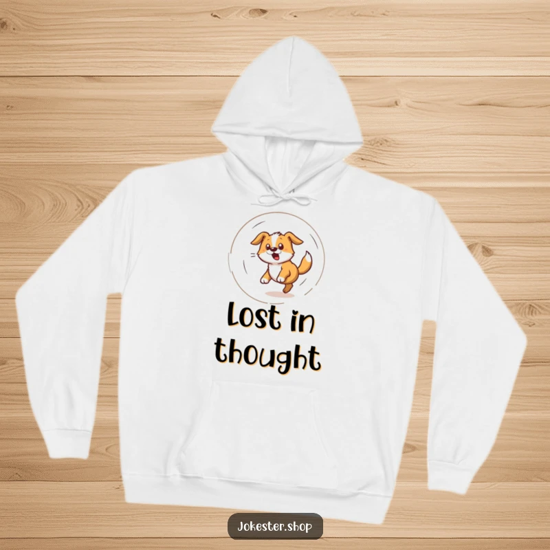 Funny hoodie illustration of a dog in a frantic, dizzy spiral as it chases its own tail, pure canine energy.