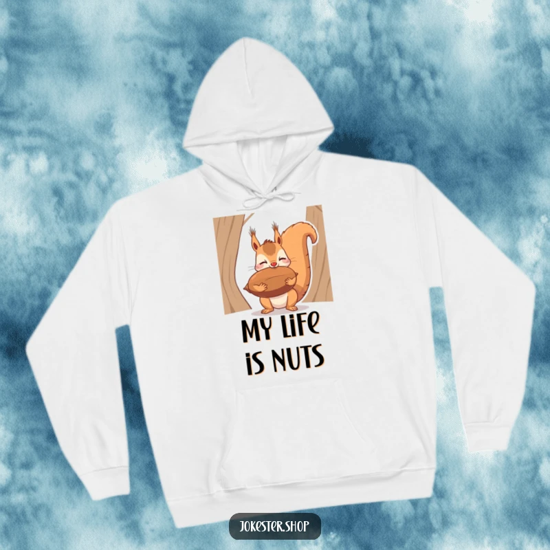 Funny hoodie print of a squirrel struggling to keep a giant nut balanced on its nose, a comical scene of focus.