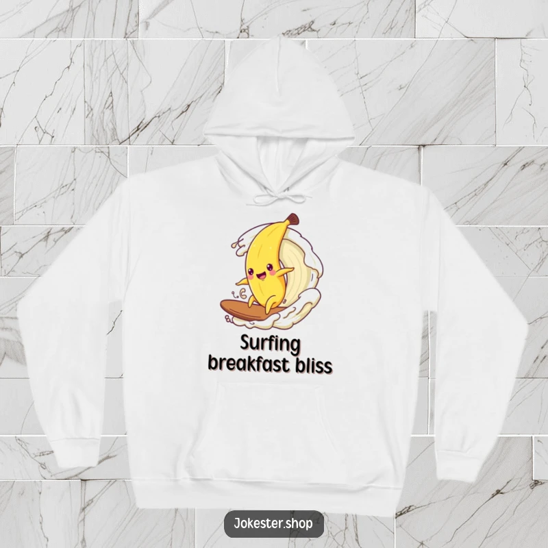 Funny hoodie depicting a happy banana character surfing on a frothy wave of cream.
