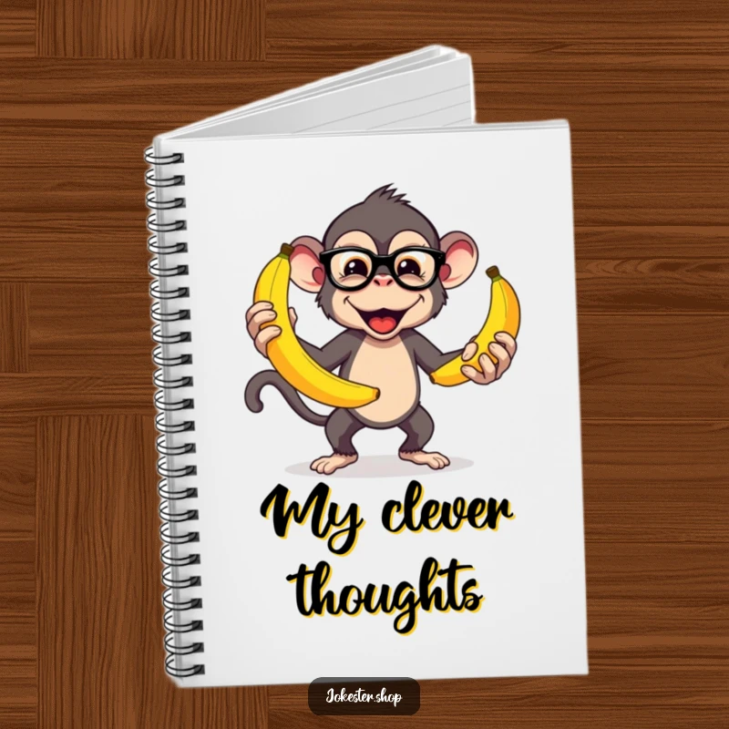 Funny notebook cover with a mischievous monkey wearing glasses, juggling oversized bananas, perfect for notes and creative ideas.