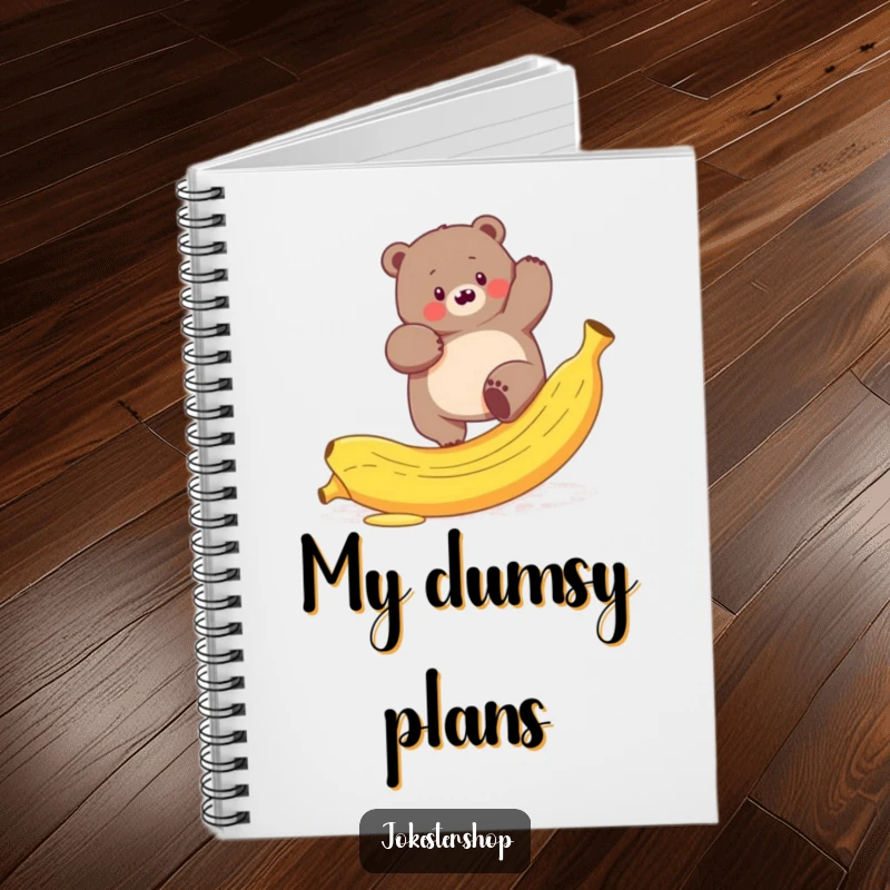 Funny notebook cover with a plump bear hilariously trying to climb a slippery banana peel, ideal for notes.