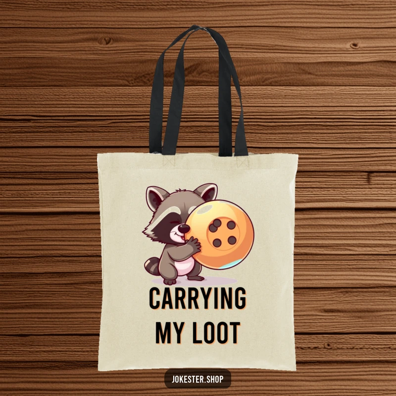 Funny raccoon tote bag with a mischievous raccoon attempting to steal a giant, shiny button, perfect for carrying items humorously.
